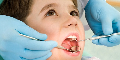 child at dental cleaning