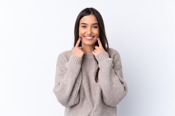woman smiling about dental implant care in Plano