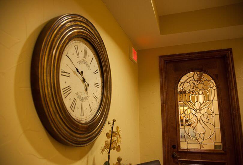 decorative clock by front entry