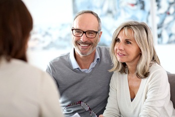 couple at a dental implant consultation