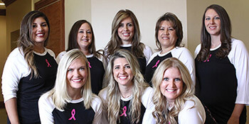 Parkway Vista Dental team in Plano wearing breast cancer awareness shirts