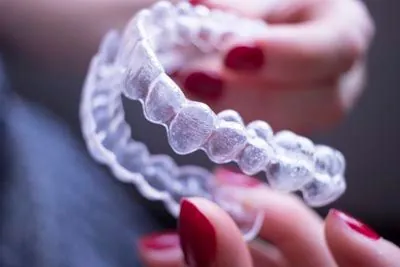 Invisalign clear aligners offered at Parkway Vista Dental